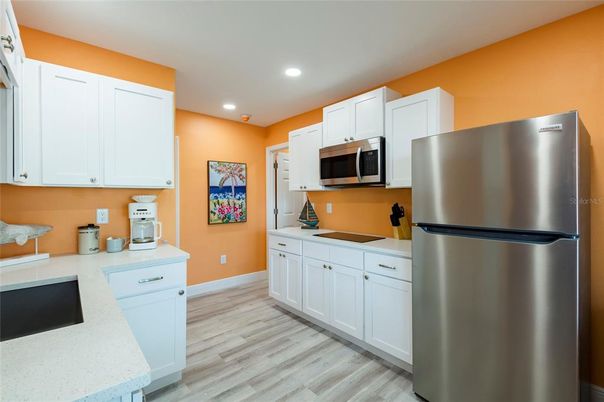 Interior, Kitchen, Recessed Lighting, Stainless Steel Appliances, Wood Texture Flooring