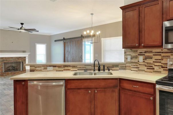 Fireplace, Interior, Kitchen, Pendant Lights, Stainless Steel Appliances