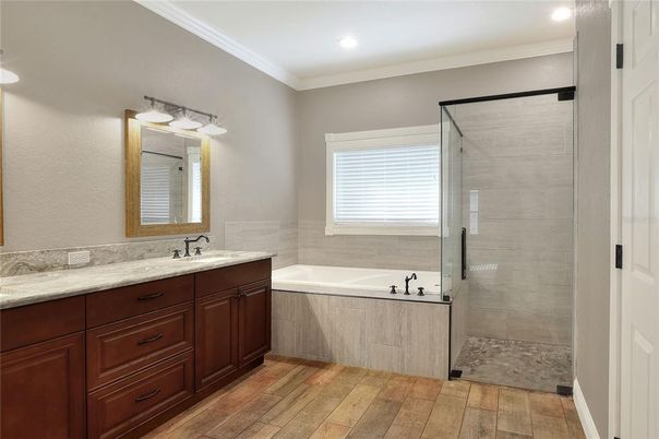Bathroom, Dual Sink Vanities, Glass Shower, Interior, Recessed Lighting, Wood Texture Flooring