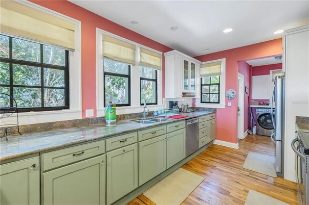 Interior, Kitchen, Recessed Lighting, Washer, Wood Texture Flooring