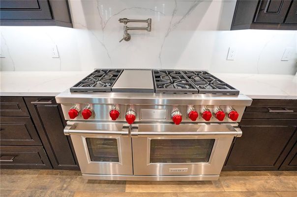 Interior, Kitchen, Marble Walls, Stainless Steel Appliances, Wood Texture Flooring