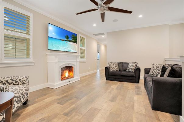 Fireplace, Interior, Living room, Recessed Lighting, Wood Texture Flooring