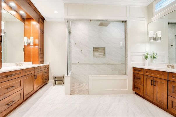 Bathroom, Dual Sink Vanities, Glass Shower, Interior, Marble, Marble Walls, Recessed Lighting