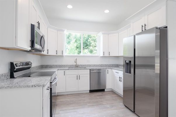 Interior, Kitchen, Recessed Lighting, Stainless Steel Appliances, Wood Texture Flooring