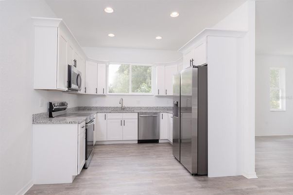 Interior, Kitchen, Recessed Lighting, Stainless Steel Appliances, Wood Texture Flooring