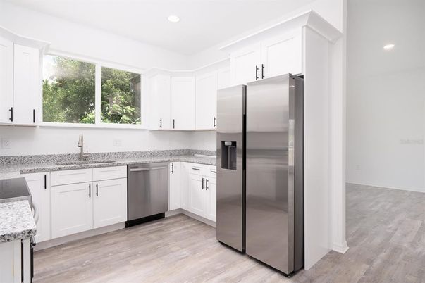 Interior, Kitchen, Recessed Lighting, Stainless Steel Appliances, Wood Texture Flooring