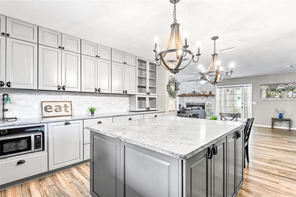 Chandelier, Fireplace, Interior, Kitchen, Stone Walls, Wood Texture Flooring