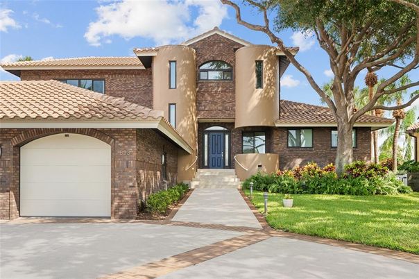 Attached, Exterior, Facade, Brick Facade, Mediterranean