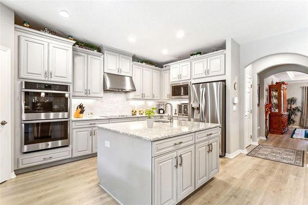 Interior, Kitchen, Recessed Lighting, Stainless Steel Appliances, Wood Texture Flooring