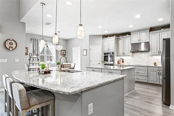 Interior, Kitchen, Pendant Lights, Recessed Lighting, Stainless Steel Appliances, Wood Texture Flooring