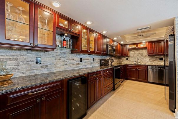 Interior, Kitchen, Recessed Lighting, Stainless Steel Appliances, Stone Walls, Wood Texture Flooring
