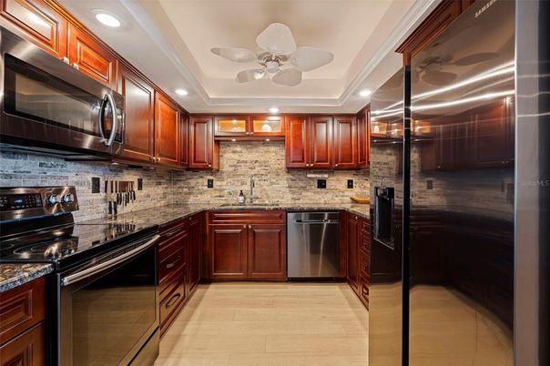 Interior, Kitchen, Recessed Lighting, Stainless Steel Appliances, Stone Walls, Wood Texture Flooring