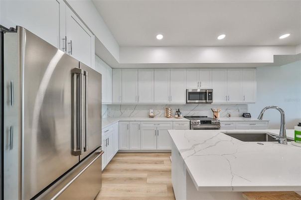 Interior, Kitchen, Recessed Lighting, Stainless Steel Appliances, Wood Texture Flooring