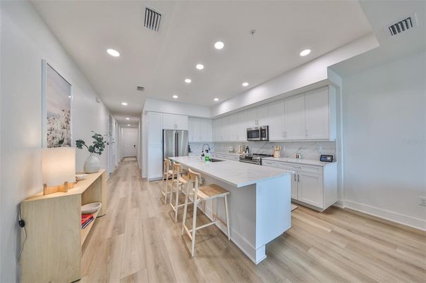 Interior, Kitchen, Recessed Lighting, Stainless Steel Appliances, Wood Texture Flooring