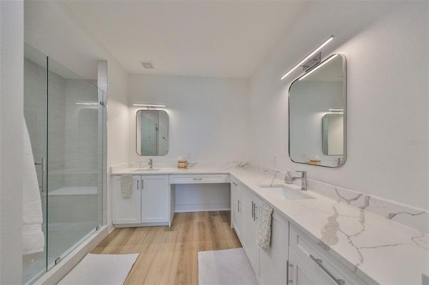 Bathroom, Dual Sink Vanities, Glass Shower, Interior, Wood Texture Flooring
