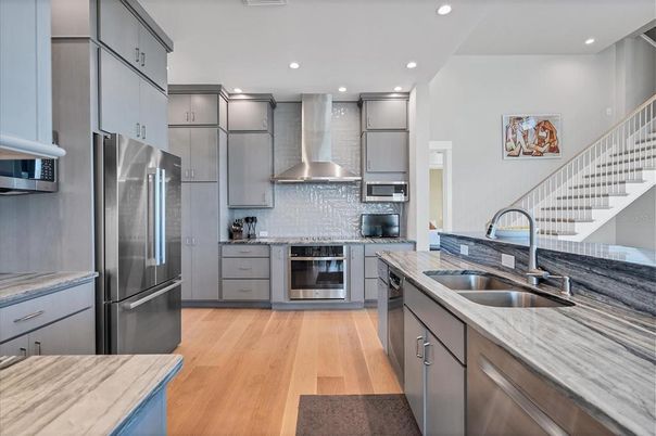 Interior, Kitchen, Recessed Lighting, Stainless Steel Appliances, Wood Texture Flooring