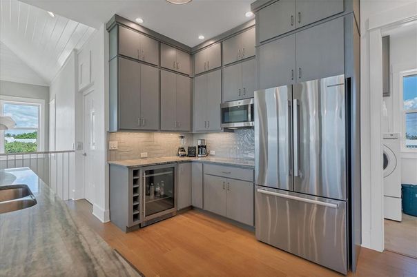 Interior, Kitchen, Recessed Lighting, Stainless Steel Appliances, Washer, Wood Texture Flooring