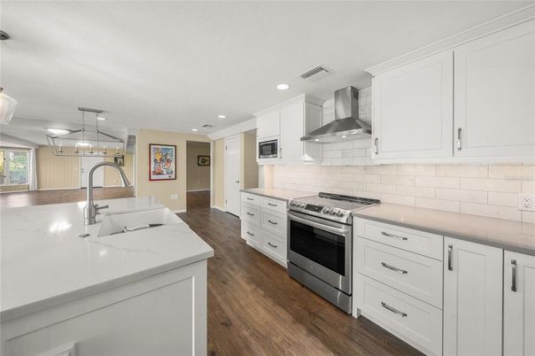 Interior, Kitchen, Pendant Lights, Recessed Lighting, Stainless Steel Appliances, Wood Texture Flooring