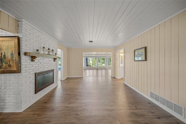Empty room, Fireplace, Interior, Stone Walls, Wood Texture Flooring