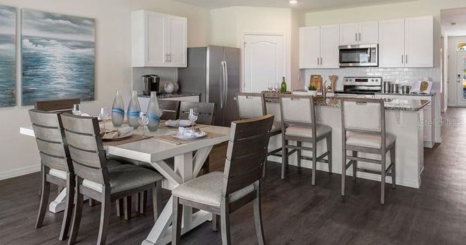 Dining room, Interior, Kitchen, Recessed Lighting, Stainless Steel Appliances, Wood Texture Flooring