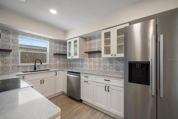 Interior, Kitchen, Recessed Lighting, Stainless Steel Appliances, Wood Texture Flooring