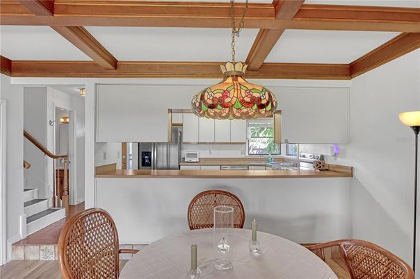 Dining room, Interior, Kitchen, Pendant Lights, Stainless Steel Appliances, Wooden Beams, Wood Texture Flooring