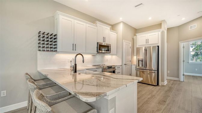 Interior, Kitchen, Recessed Lighting, Stainless Steel Appliances, Wood Texture Flooring