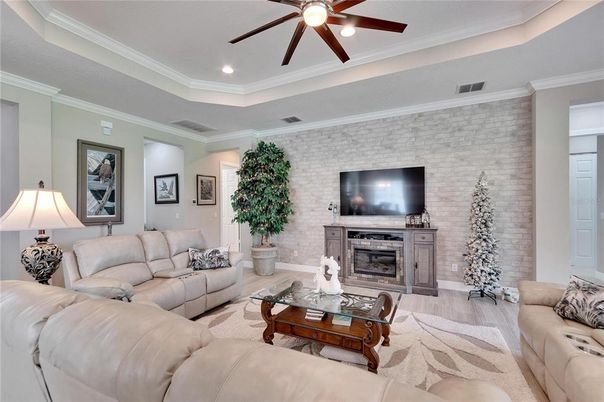 Fireplace, Interior, Living room, Recessed Lighting, Stone Walls, Wood Texture Flooring