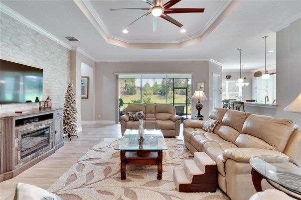 Fireplace, Interior, Living room, Pendant Lights, Recessed Lighting, Stone Walls, Wood Texture Flooring