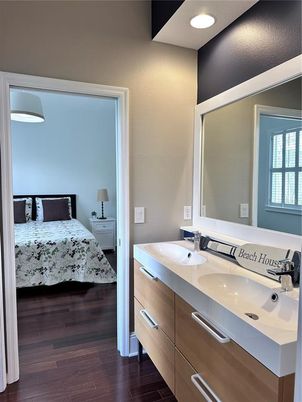 Bathroom, Bedroom, Dual Sink Vanities, Interior, Recessed Lighting, Wood Texture Flooring
