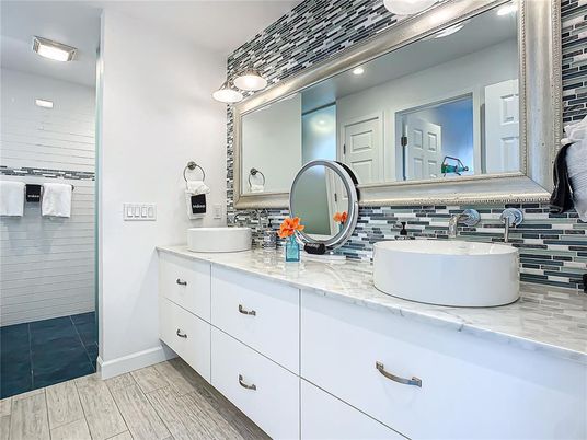 Bathroom, Dual Sink Vanities, Interior, Recessed Lighting, Wood Texture Flooring
