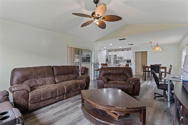 Dining room, Interior, Kitchen, Living room, Pendant Lights, Recessed Lighting, Stainless Steel Appliances, Wood Texture Flooring