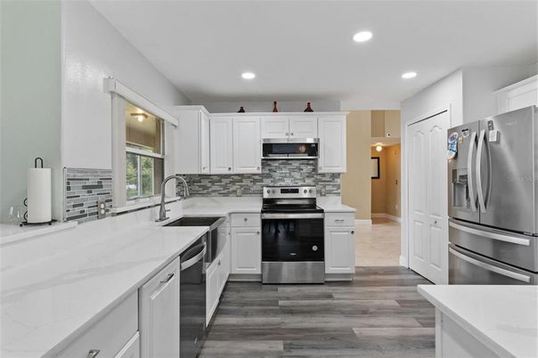 Interior, Kitchen, Recessed Lighting, Stainless Steel Appliances, Wood Texture Flooring