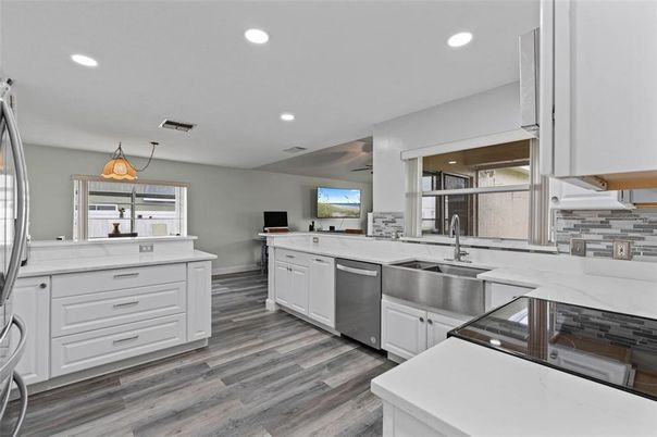 Interior, Kitchen, Pendant Lights, Recessed Lighting, Stainless Steel Appliances, Wood Texture Flooring