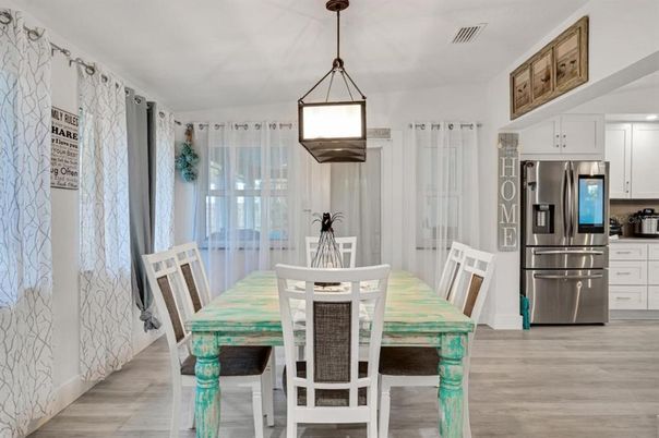 Dining room, Interior, Kitchen, Pendant Lights, Stainless Steel Appliances, Wood Texture Flooring