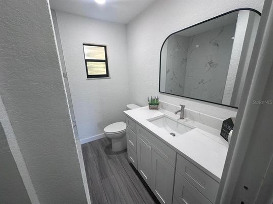 Bathroom, Interior, Marble Walls, Recessed Lighting, Wood Texture Flooring