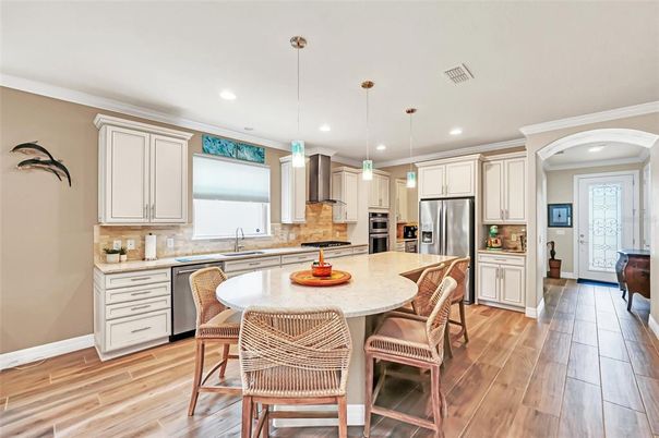 Interior, Kitchen, Pendant Lights, Recessed Lighting, Stainless Steel Appliances, Wood Texture Flooring