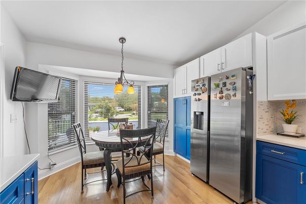 Dining room, Interior, Kitchen, Pendant Lights, Stainless Steel Appliances, Wood Texture Flooring