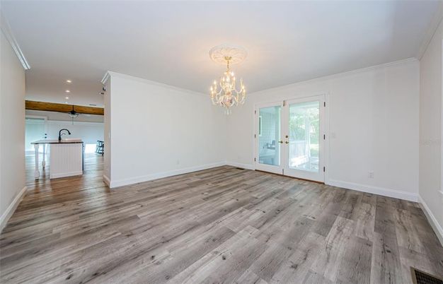 Chandelier, Empty room, Interior, Recessed Lighting, Wood Texture Flooring