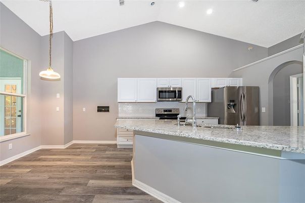Interior, Kitchen, Pendant Lights, Recessed Lighting, Stainless Steel Appliances, Wood Texture Flooring