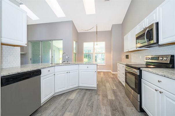 Interior, Kitchen, Pendant Lights, Stainless Steel Appliances, Wood Texture Flooring