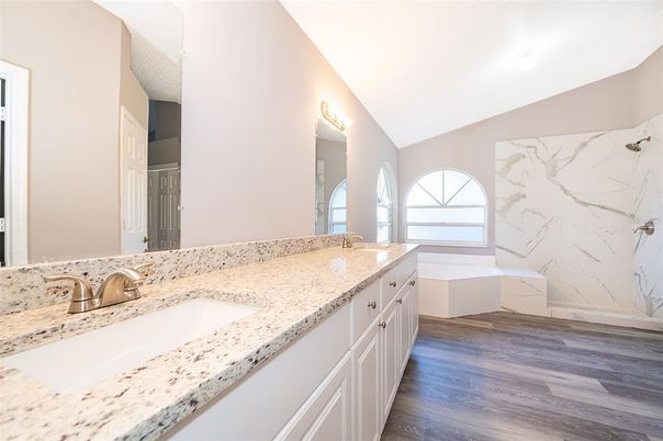 Bathroom, Dual Sink Vanities, Interior, Marble Walls, Wood Texture Flooring
