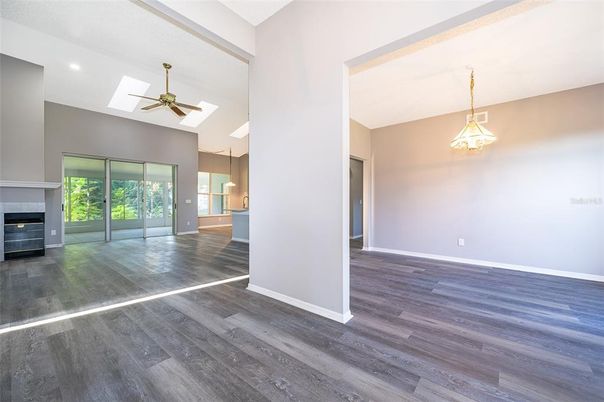 Empty room, Fireplace, Interior, Pendant Lights, Recessed Lighting, Wood Texture Flooring