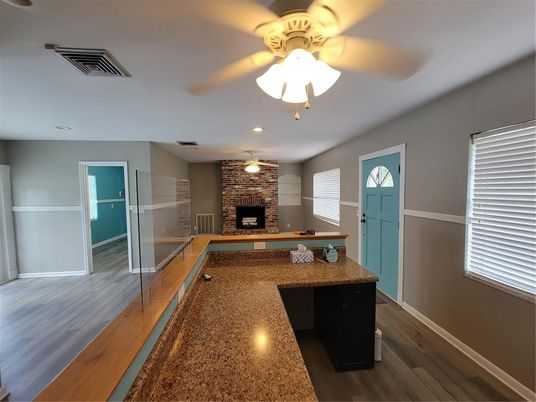 Fireplace, Interior, Recessed Lighting, Stone Walls, Wood Texture Flooring