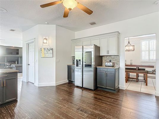 Dining room, Interior, Kitchen, Pendant Lights, Stainless Steel Appliances, Wood Texture Flooring