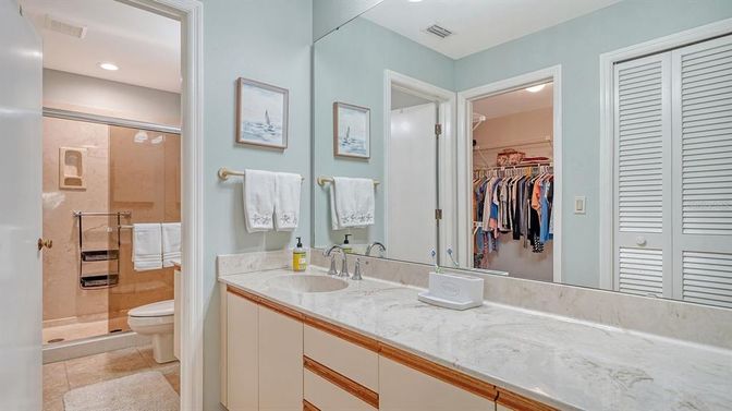 Bathroom, Dual Sink Vanities, Glass Shower, Interior, Recessed Lighting, Walk-in Closets