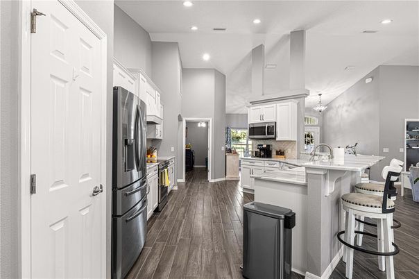 Interior, Kitchen, Pendant Lights, Recessed Lighting, Stainless Steel Appliances, Wood Texture Flooring