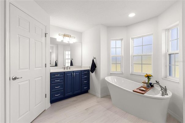 Bathroom, Dual Sink Vanities, Free Standing Baths, Interior, Recessed Lighting, Wood Texture Flooring