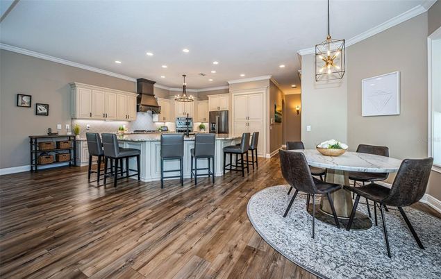 Dining room, Interior, Kitchen, Pendant Lights, Recessed Lighting, Stainless Steel Appliances, Wood Texture Flooring