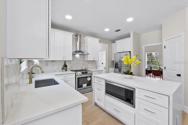 Interior, Kitchen, Recessed Lighting, Stainless Steel Appliances, Wood Texture Flooring